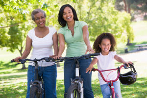 mother daughter mother-in-law riding bikes